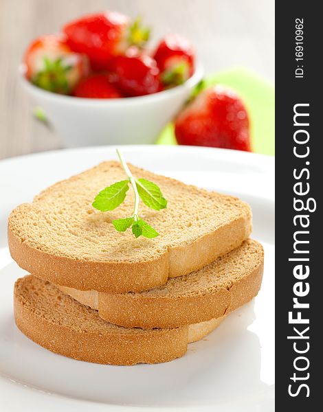 Three stacked rusk on a plate