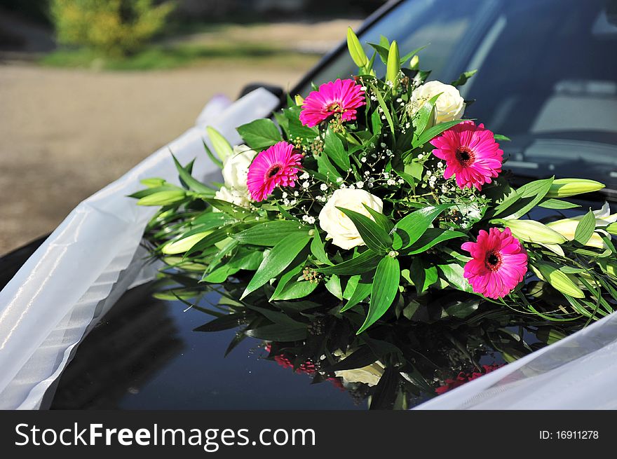 Beautiful colorful weeding flowers on car. Beautiful colorful weeding flowers on car