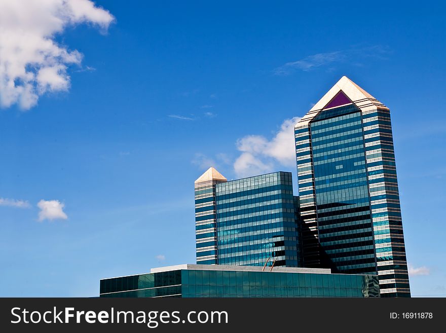 Modern Building And Blue Cloud Sky