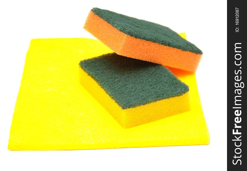 Yellow rag and kitchen sponge, isolated on white