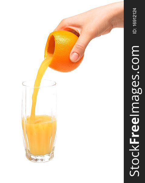 Fresh squeezed pouring orange juice isolated on a white background. Fresh squeezed pouring orange juice isolated on a white background