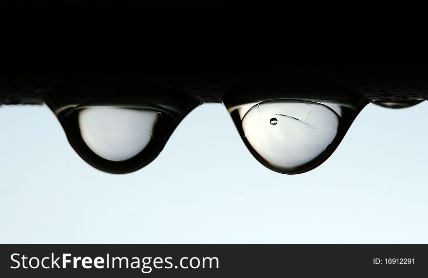 Ice drops isolated on light background