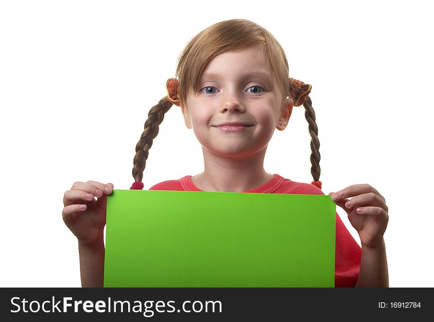 Little funny girl with green sheet of paper in the hands isolated over white background. Little funny girl with green sheet of paper in the hands isolated over white background