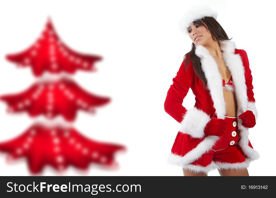 Beautiful girl wearing santa claus clothes