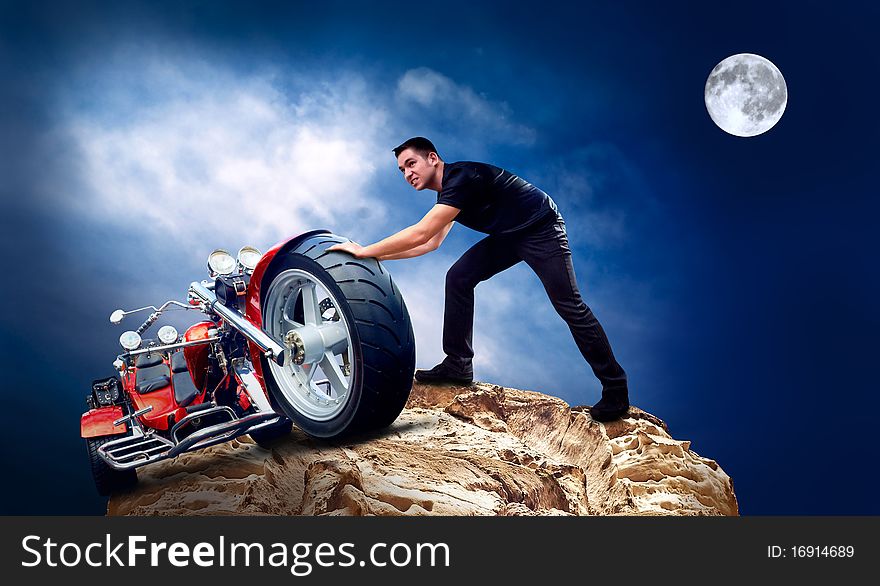 Men with motorbike on the top of mountains in night and moon. Men with motorbike on the top of mountains in night and moon.