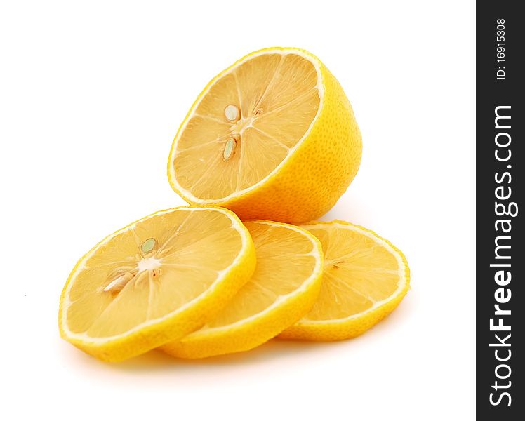 Chopped lemon slices on white background