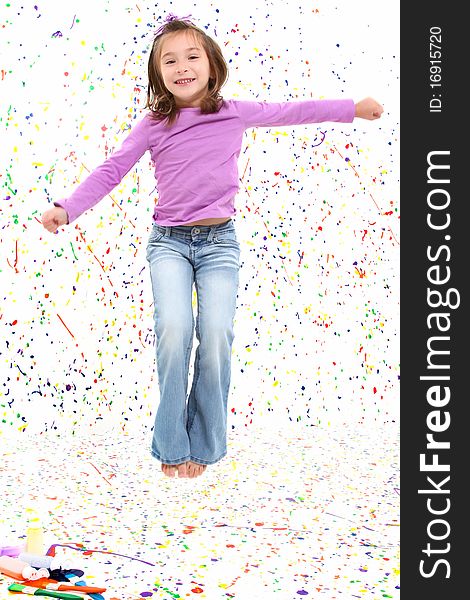 Beautiful 5 year old girl over paint splatter background jumping and smiling. Beautiful 5 year old girl over paint splatter background jumping and smiling.