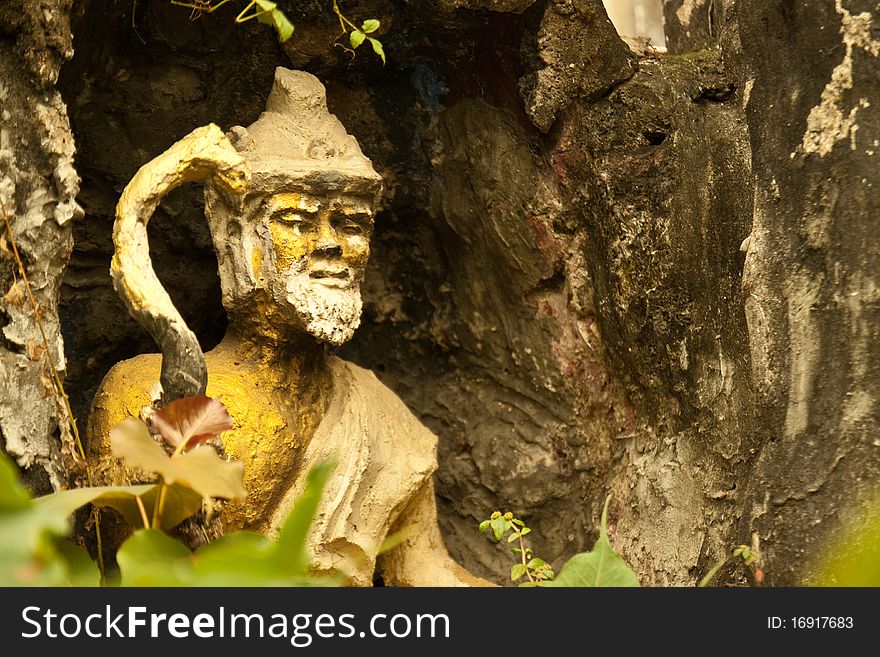 Ascetic statue in the old temple