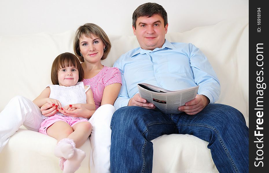 Dad, Mom and their little daughter fun time together.