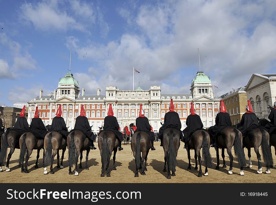 Mounted cavalry on Horse Guards Parade, Whitehall, London in front of Old Admiralty. Mounted cavalry on Horse Guards Parade, Whitehall, London in front of Old Admiralty