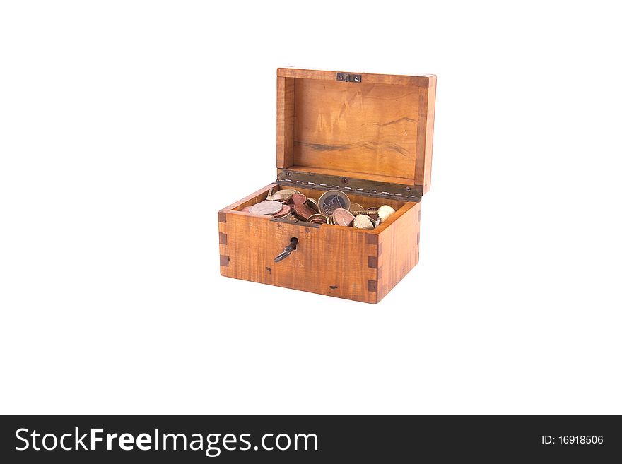 Antique handcrafted open wooden money box with small money isolated on a white background