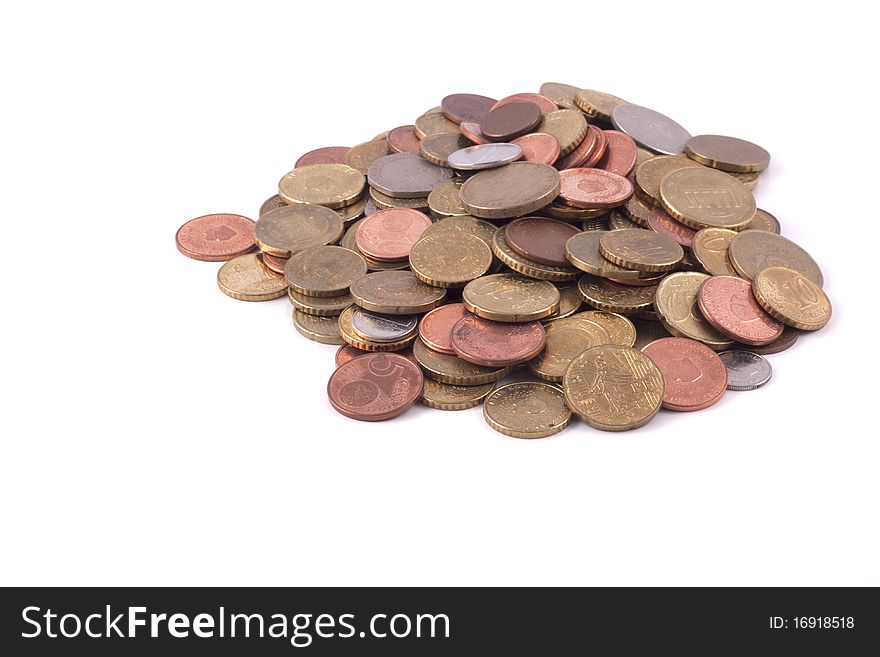 A lot of coins isolated on a white background