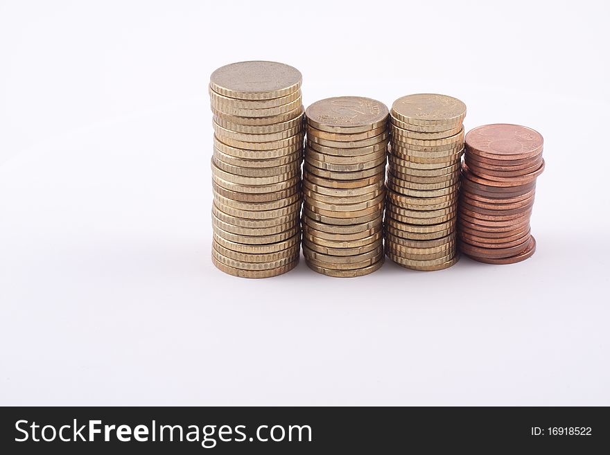 A diversity of coins isolated on a white background. A diversity of coins isolated on a white background