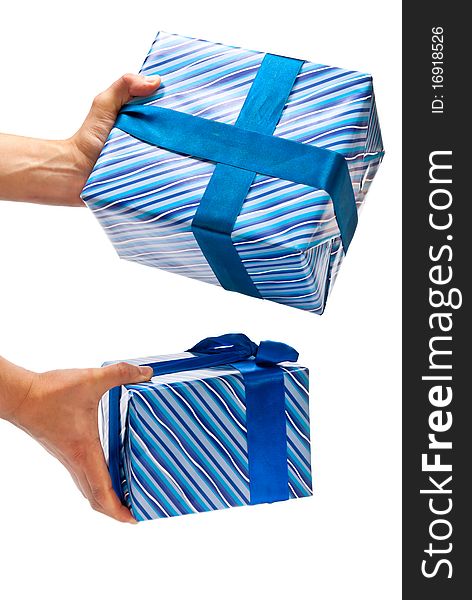 Two blue gifts boxes in man's hands. Isolated on white. Two blue gifts boxes in man's hands. Isolated on white