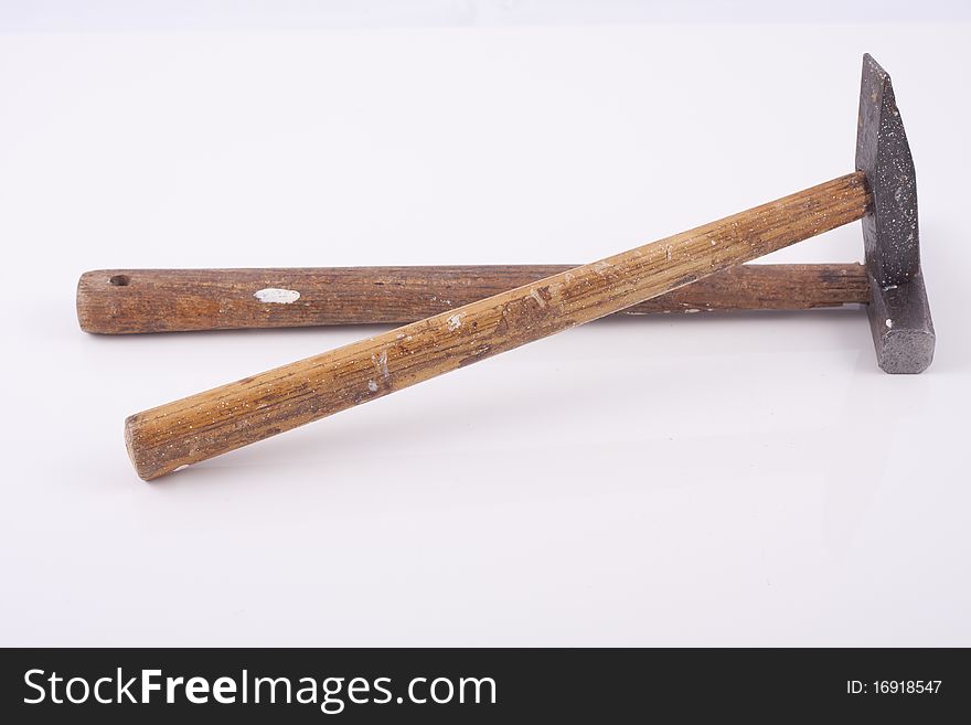 Old used small rusty hammers isolated on white background. Old used small rusty hammers isolated on white background.