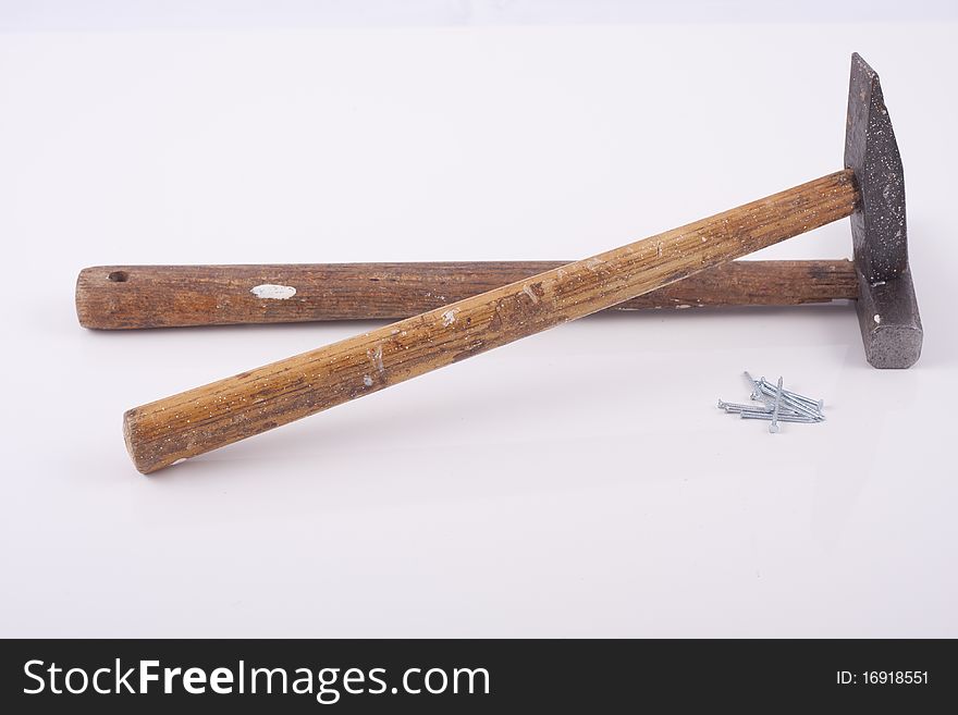 Old used small rusty hammers isolated on white background. Old used small rusty hammers isolated on white background.