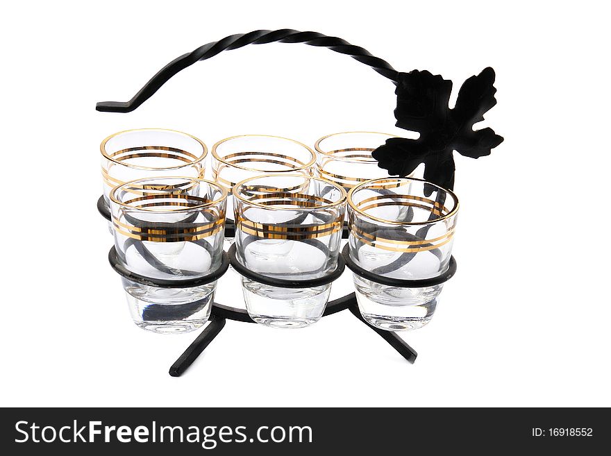 Empty vine glasses on the stand. Isolated on white background