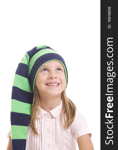 Child in a green cap on white background