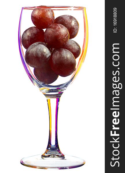 Wine glass with grapes, isolated on white