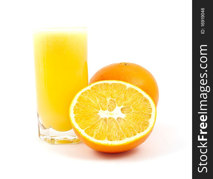 Cup fresh-squeezed orange juice and oranges on a white background