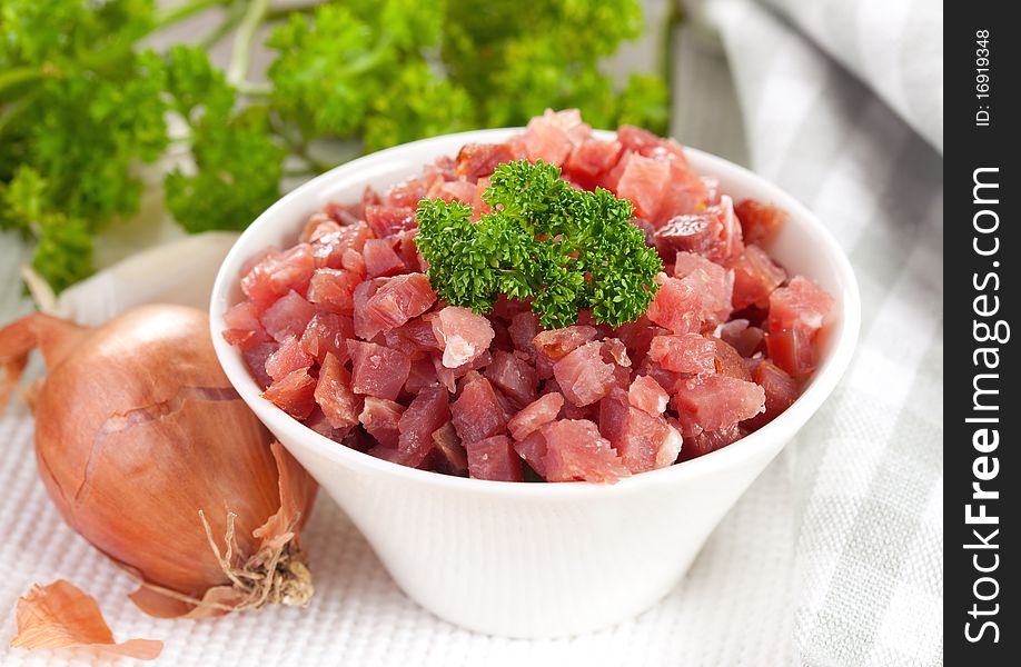 Fresh ham diced in a bowl