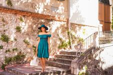 Young And Beautiful Brunette Girl In Dress And Hat Walking Outdoor In The Street. Nice, France. Summer Vacation Stock Photography