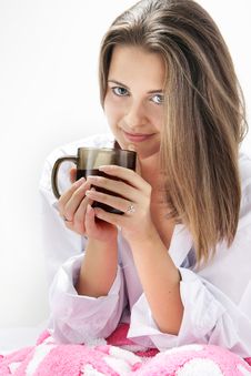 Young Girl With Cup Of Tea In Bed Royalty Free Stock Photos Young Girl With Cup Of Tea In Bed Royalty Free Stock Photos
