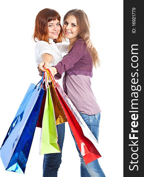 Two teen girls with bags. Isolated on white background