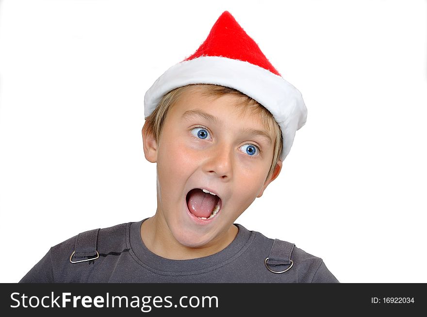 Laughing adorable child with Santa Hat