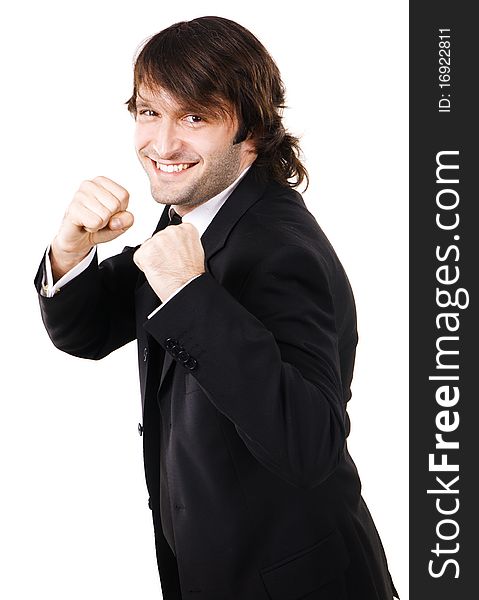 Young funny businessman showing to the camera that he is ready to fight. Young funny businessman showing to the camera that he is ready to fight