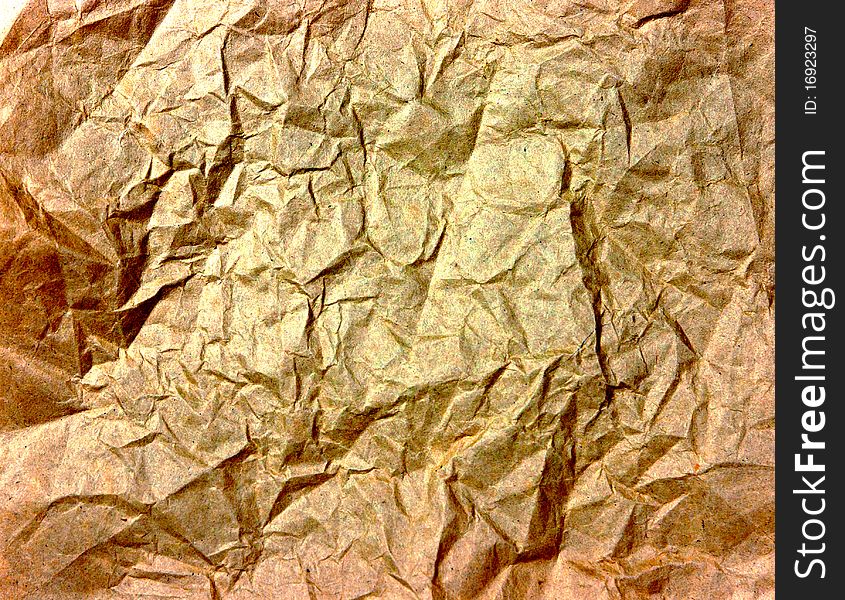 Wrinkled golden paper texture can use for background