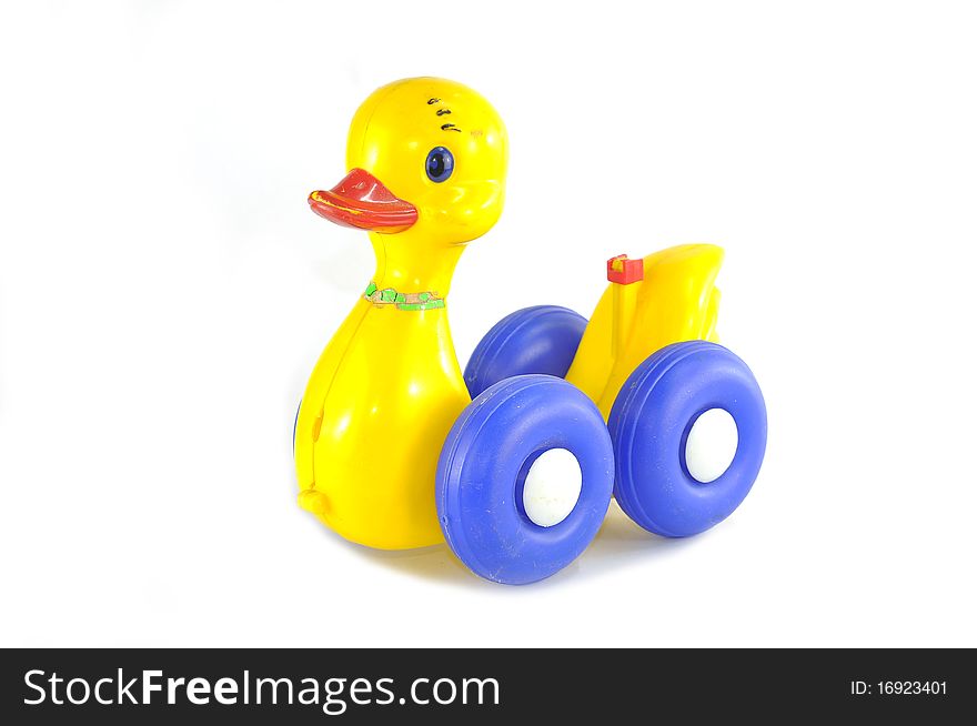 Old yellow duck toy on white background. Old yellow duck toy on white background