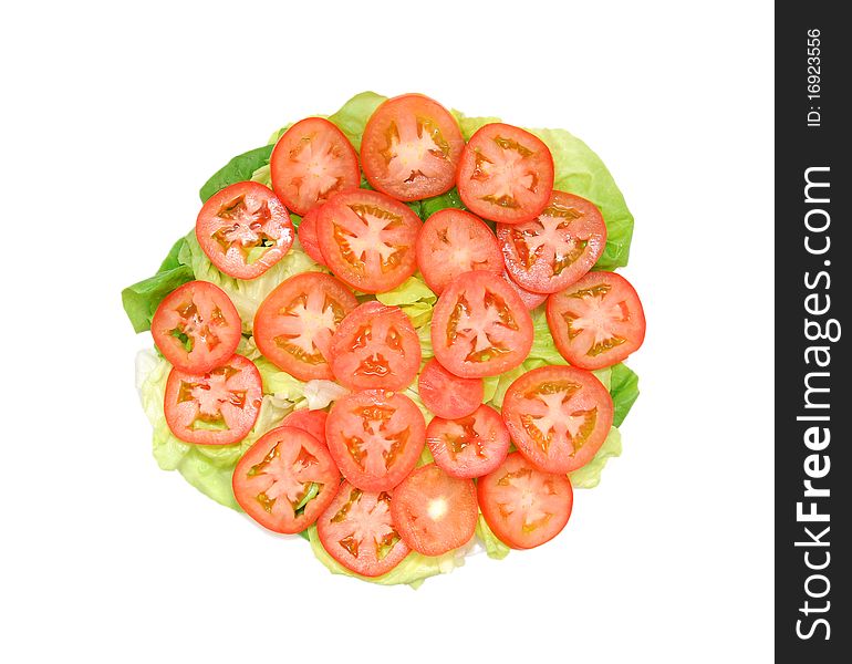 A fresh tomato and vegetables