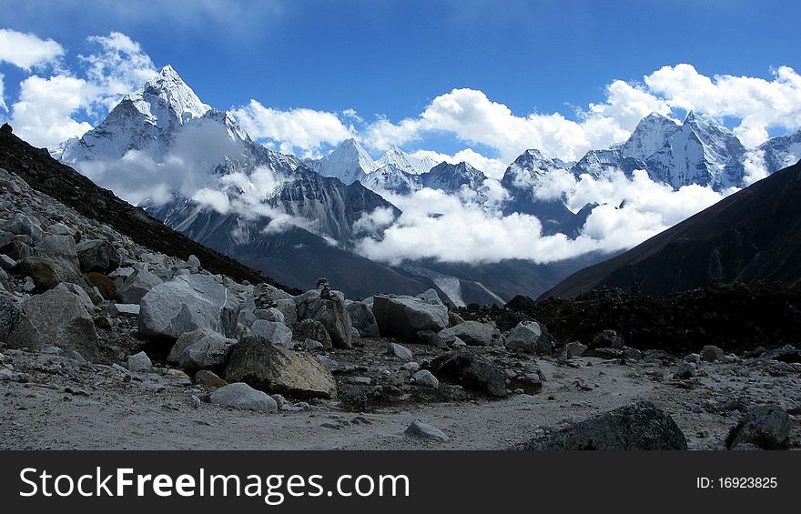 The view of Snow Mountains and Clouds at the pass of Khumbu area in Neapl
