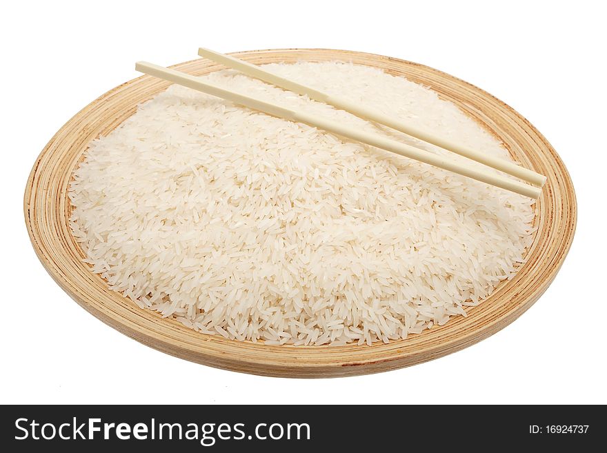 Rice, plate with raw grain for cooking against white background