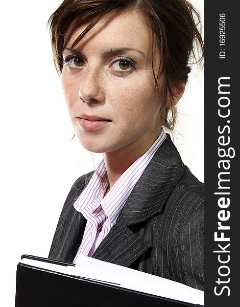 Beautiful businesswoman portrait on white background. She looks in camera. She i s a beautifiuull girl.