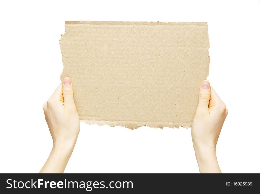 Cardboard blank in a hand isolated on white. Cardboard blank in a hand isolated on white