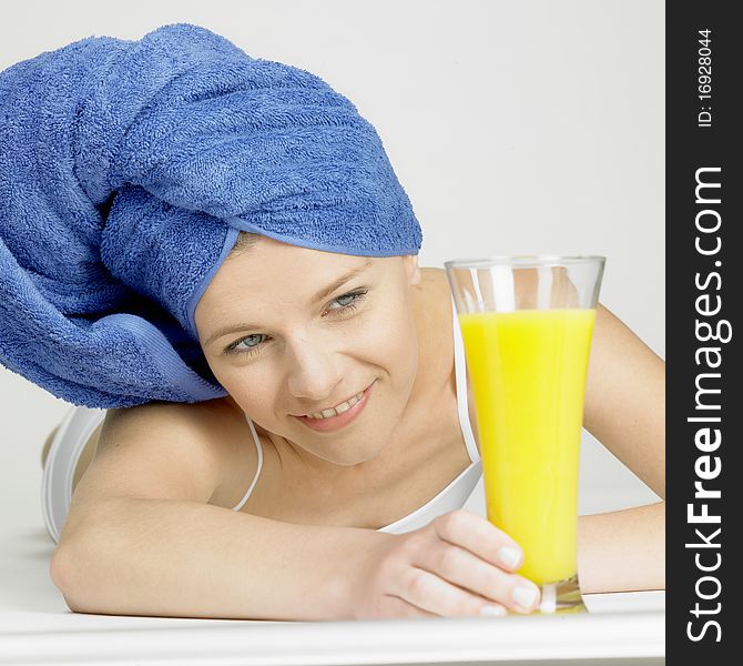 Woman with turban and a glass of juice