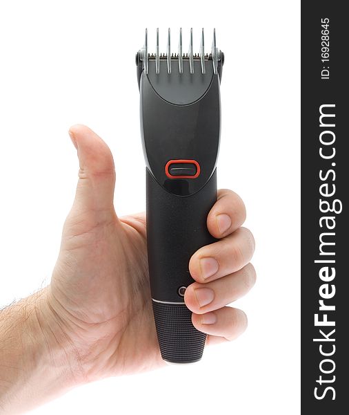 Trimmer in hand on white background