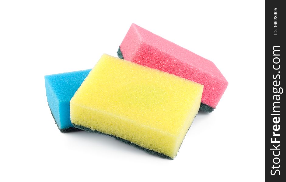 Three colored sponges isolated on white background. Three colored sponges isolated on white background