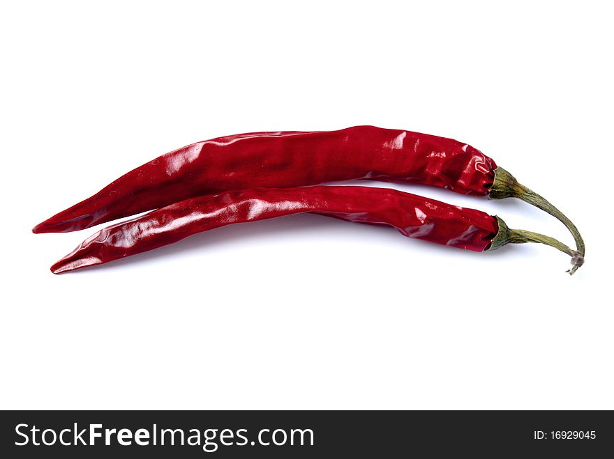 Red chili peppers isolated on white.