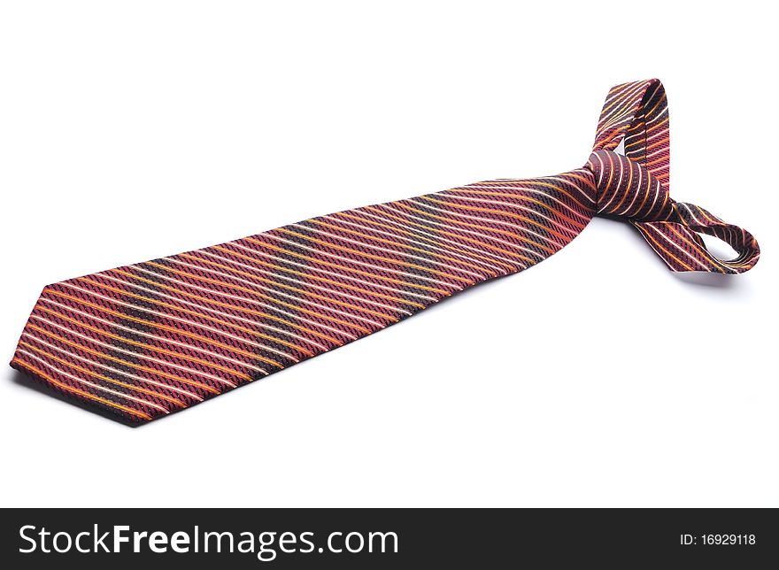 Red striped tie on a white background