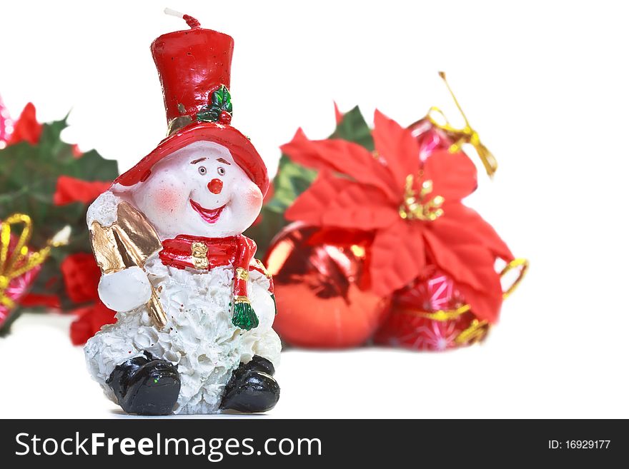 Santa Claus candle with christmas decoration isolated on white