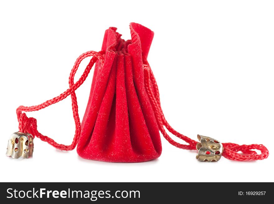 A little red bag for jewelry isolated over white