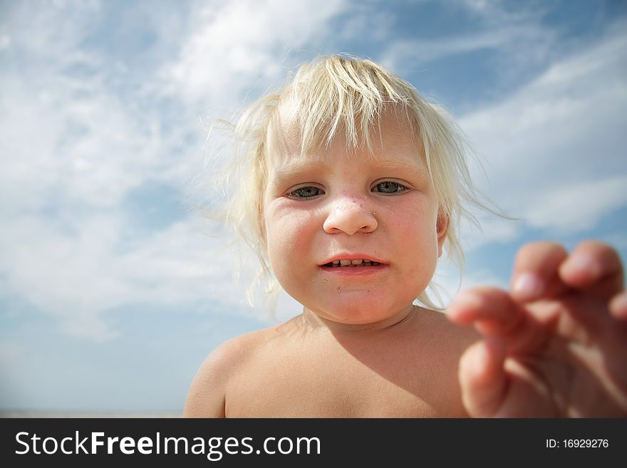 Funny Cute Child Over Sky Background