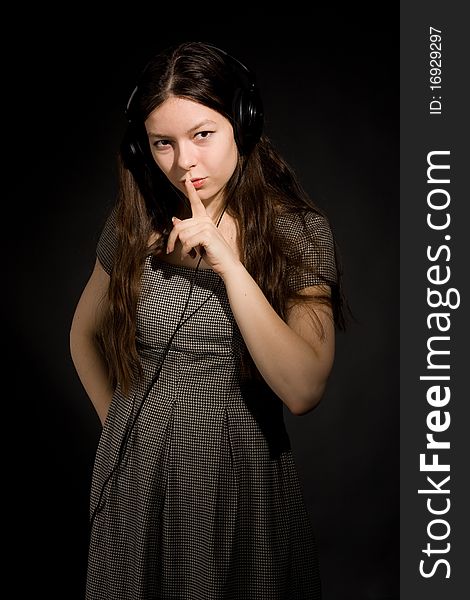 Girl in headphones listening music