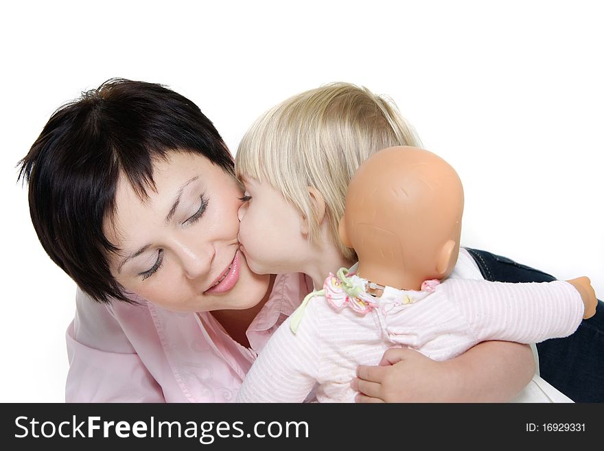 Studio shot of loving mother and daughter over white