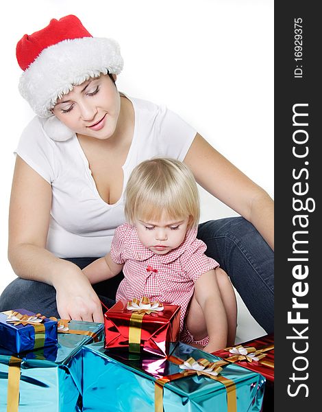 Mother and daughter with christmas gift boxes