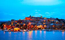 Cityscape With Marina In Mediterranian Sea In Cagliari Evening Reflex Stock Images