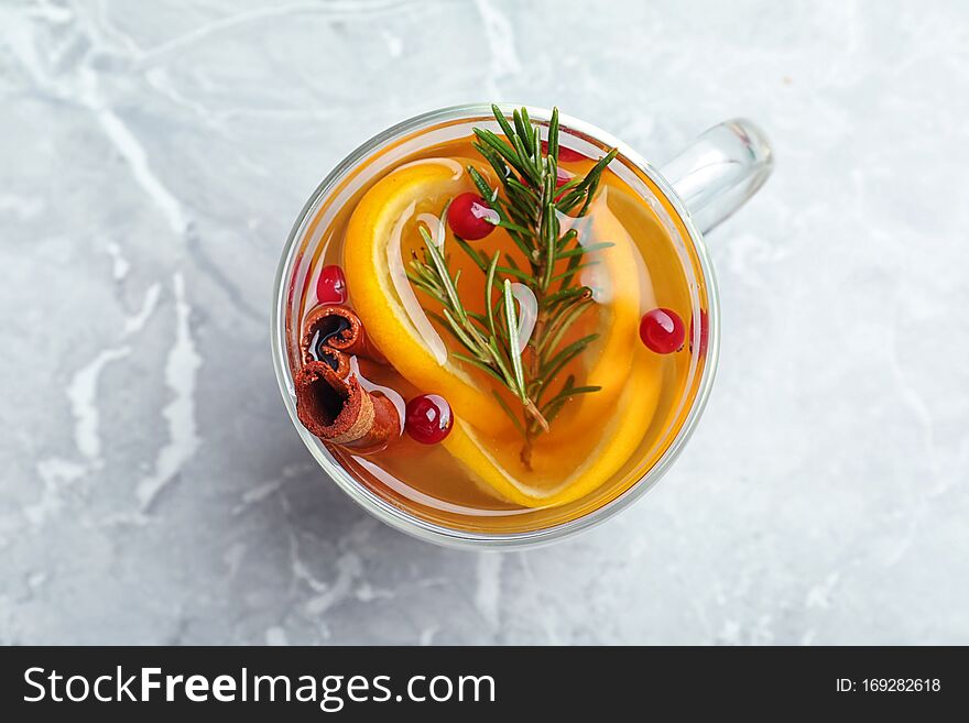 Aromatic mulled wine on grey marble table